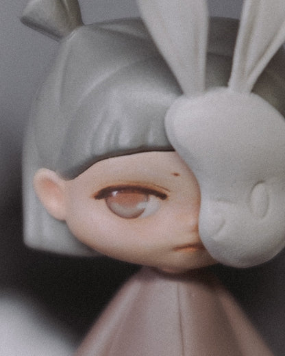 Close-up of The Wanderer's magnetic bunny mask covering one side of her face.